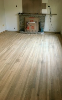 Living room during remodel after first floor sanding