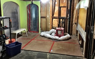 Construction in progress from entry showing framing